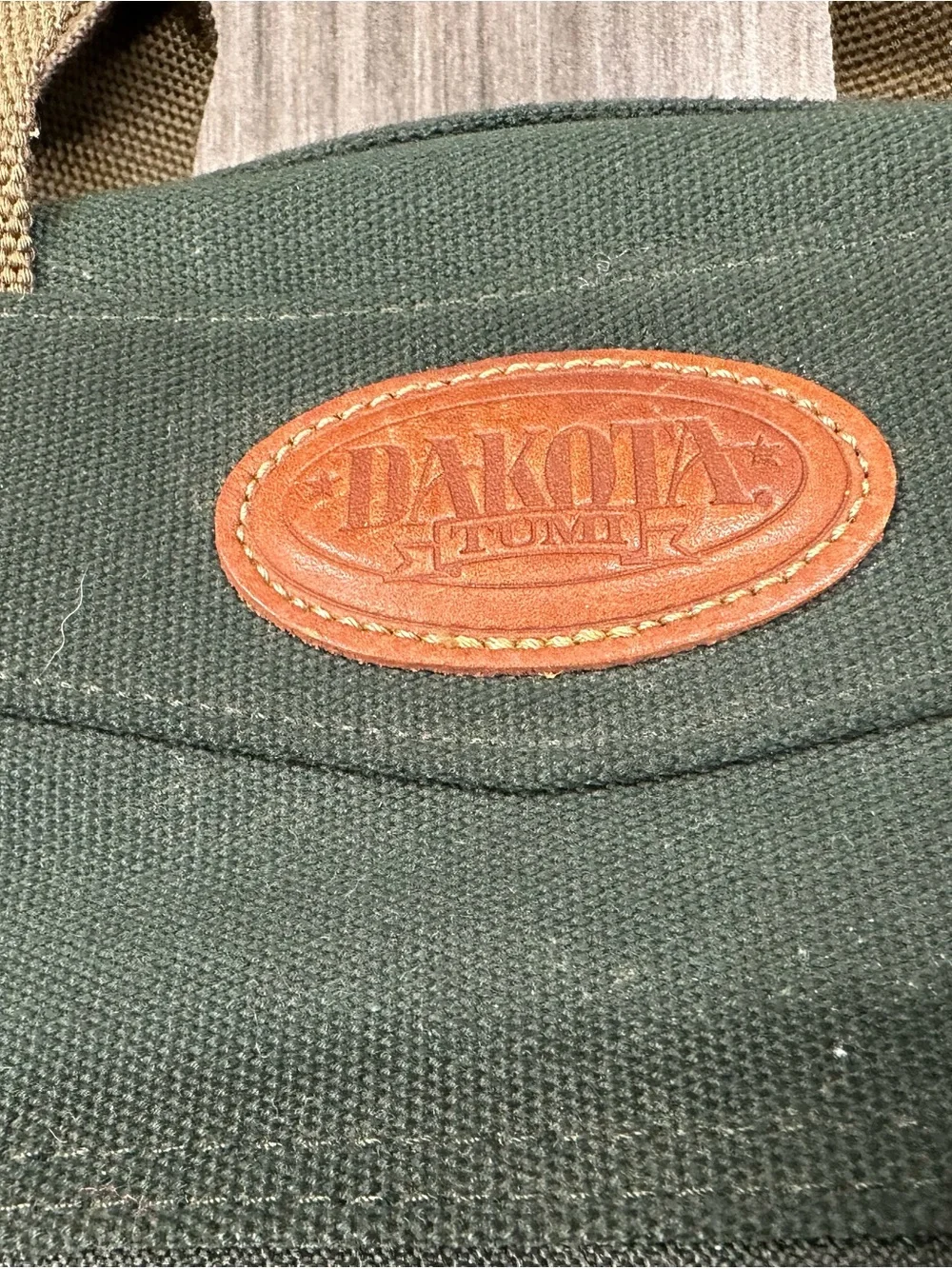 Tumi Dakota Dark Green Canvas Duffel with Tan Straps and Brown Leather Trim